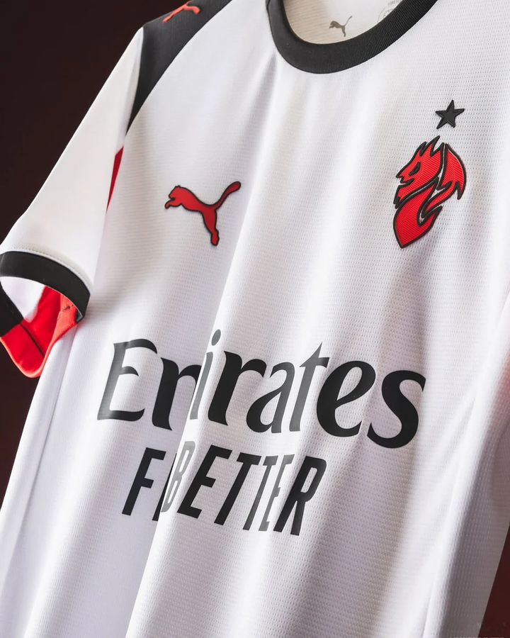Striker Store AC Milan away jersey 2025-26 in white with red and black accents and Puma logo