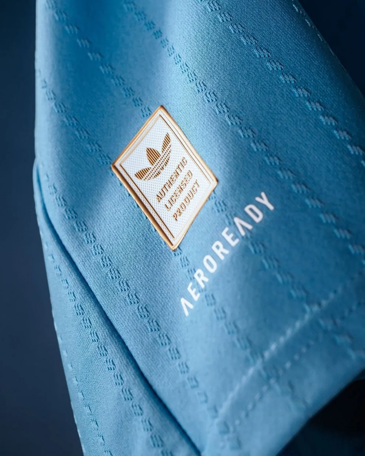 Inter Miami 2025-26 Third Jersey close up light blue Adidas AEROREADY fabric with gold authentic badge