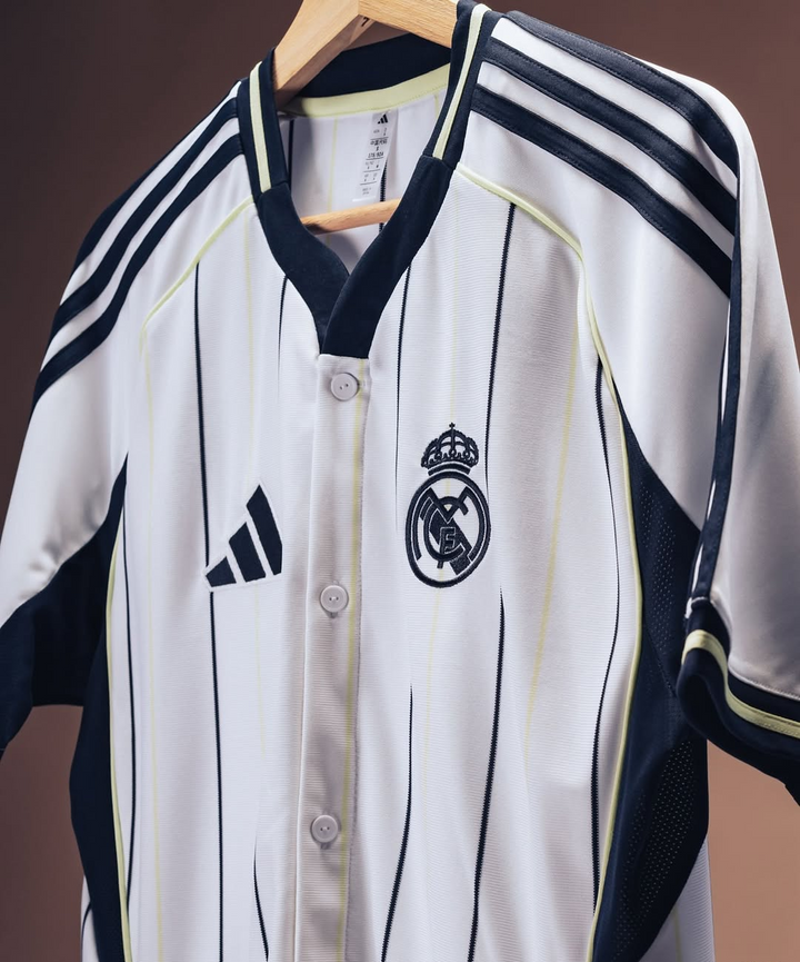 Real Madrid special edition jersey 2025-26 white pinstripe with adidas logo and club crest on hanger