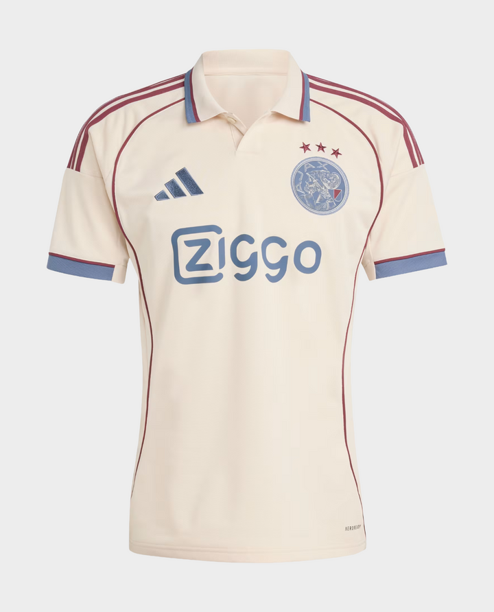 Ajax Third Jersey 2025-26 in cream color with maroon accents and Ziggo logo