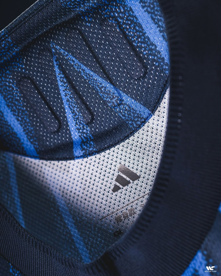 Arsenal away jersey 2025-26 featuring a stylish blue design and breathable fabric details