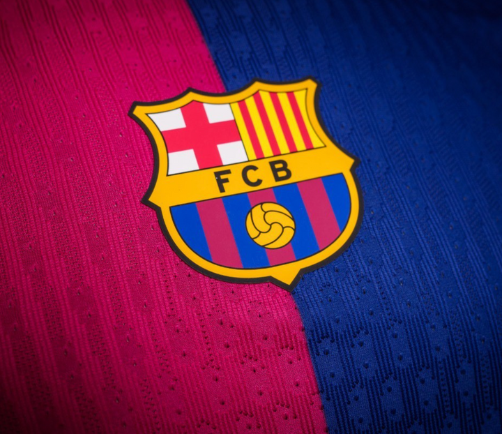 Barcelona Home Jersey 2024 featuring the iconic club emblem on a striking striped design