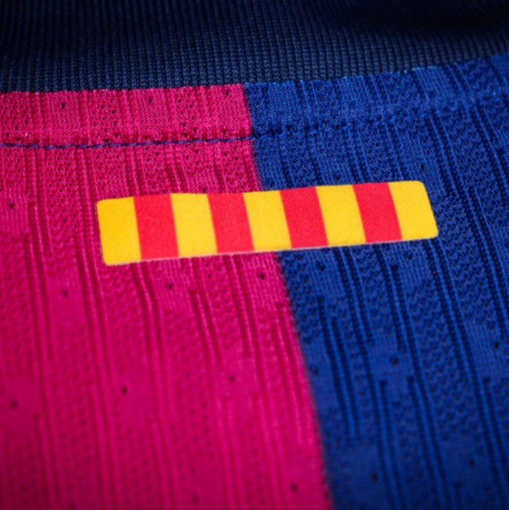 Close-up of the Barcelona Home Jersey 2024 showing the unique fabric texture and team colors