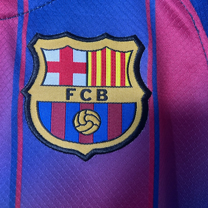 Barcelona Home Jersey 2025-26 featuring the iconic FC Barcelona logo prominently displayed