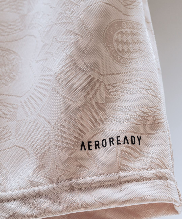 Close-up of the Bayern Munich Oktoberfest jersey 2025-26 showcasing the Aeroready technology fabric