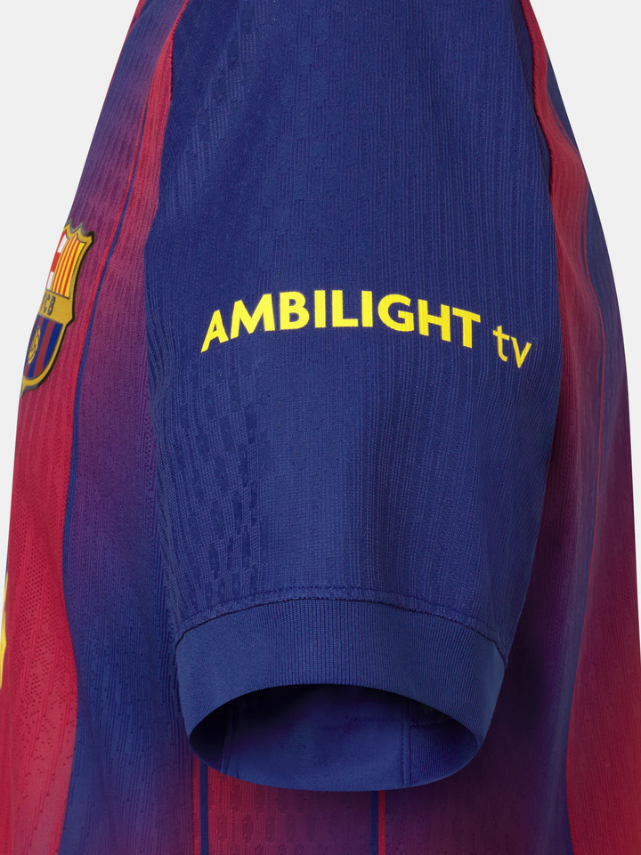 Close-up of the FC Barcelona Ed Sheeran jersey 2025-26 showcasing the Ambilight tv logo on the sleeve