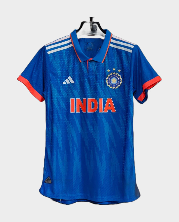 India ODI cricket jersey 2024 in blue with orange accents and adidas logo for cricket fans