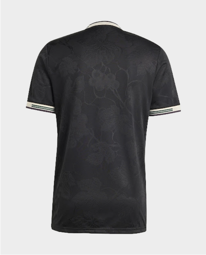 Back view of Juventus 25-26 third jersey in black with floral pattern and striped sleeves