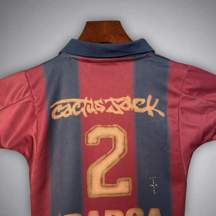 Kids Barca Travis Scott retro kit featuring Cactus Jack design and number 2 sports jersey