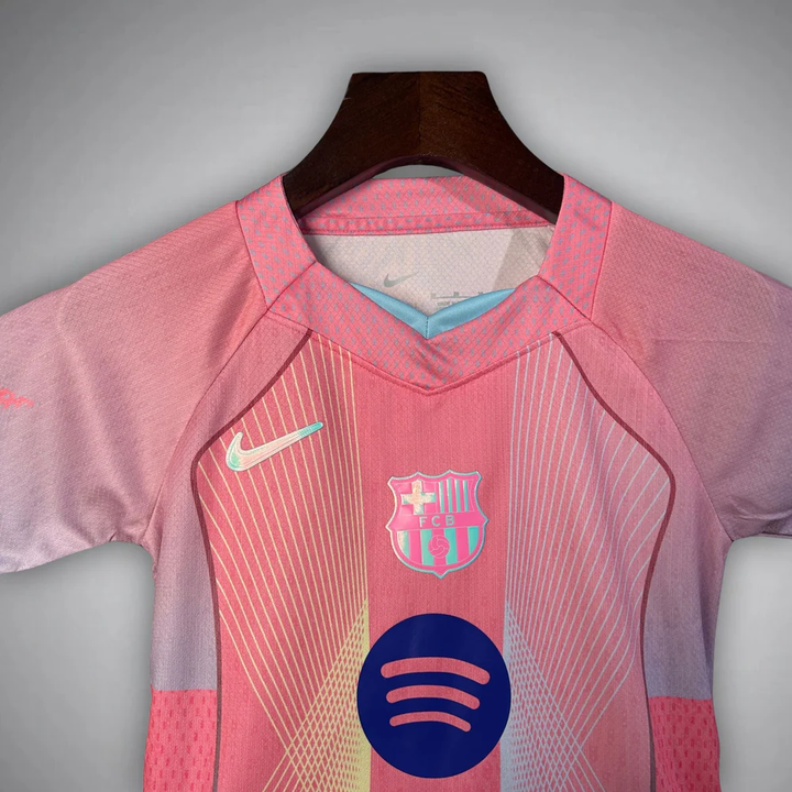 Kids FC Barcelona Pink Jersey 2025-26 featuring a stylish design by Striker Store with the official logo