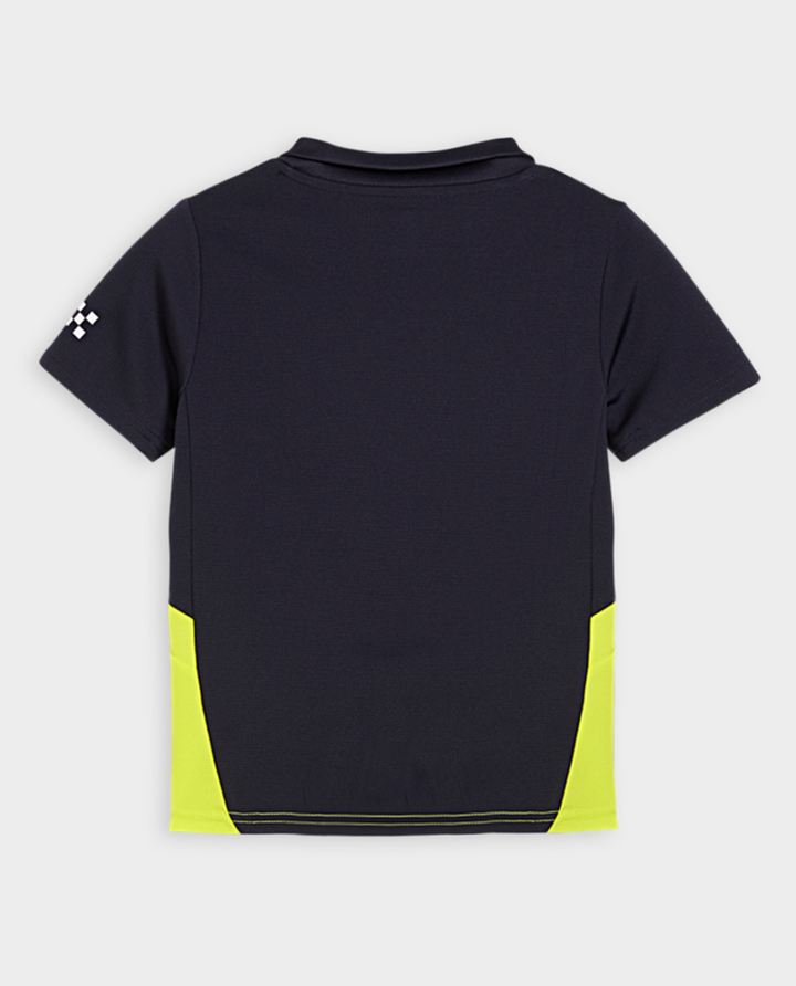 Back view of Kids Manchester City away jersey in navy and neon yellow design for young football fans