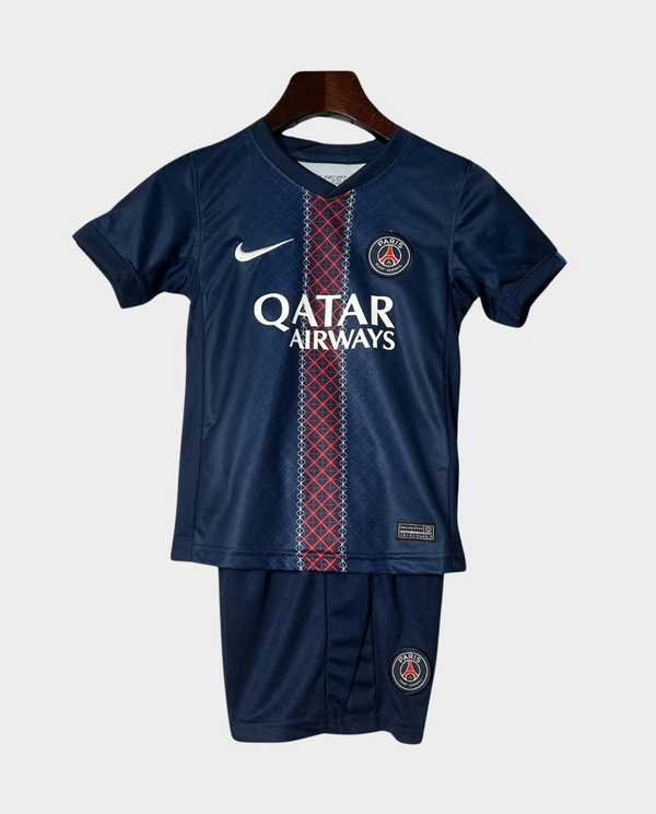 Kids PSG home kit 2025-26 jersey set in navy blue with Qatar Airways logo and authentic design