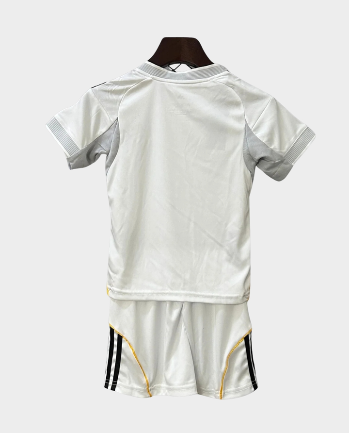 Back view of Kids Real Madrid home kit 2025-26 featuring a white jersey and shorts set