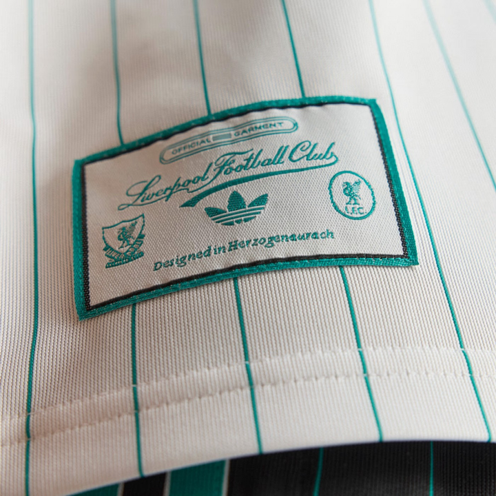 Close-up of the Liverpool Terrace Icon Jersey 2025-26 label featuring Adidas logo and Liverpool FC details