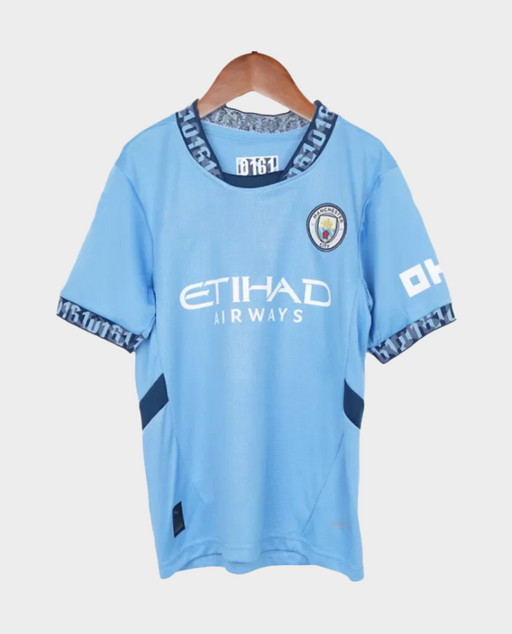 Kids Manchester City Home Jersey 2024 in light blue with vibrant collar and team logos