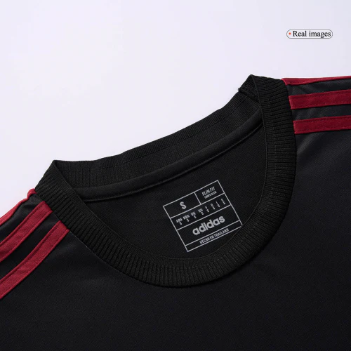 Close-up of the collar and stripes on the Manchester United CNY 2024 Jersey from Striker Store