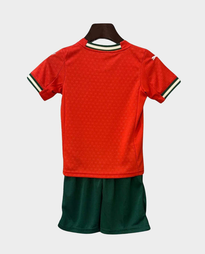 Kids Portugal football kit 2025-26 featuring a red jersey and green shorts for young fans