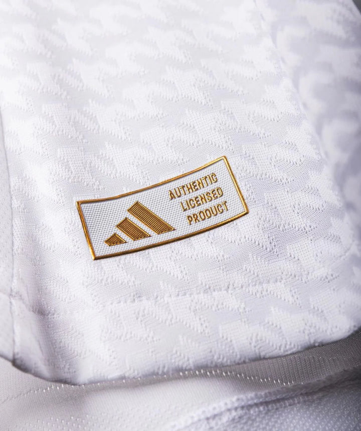 Close-up of the Authentic Licensed Product tag on the Real Madrid 2024 home jersey by Striker Store