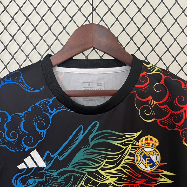 Real Madrid Dragon Jersey 2024-25 featuring colorful dragon design and team crest on a black background
