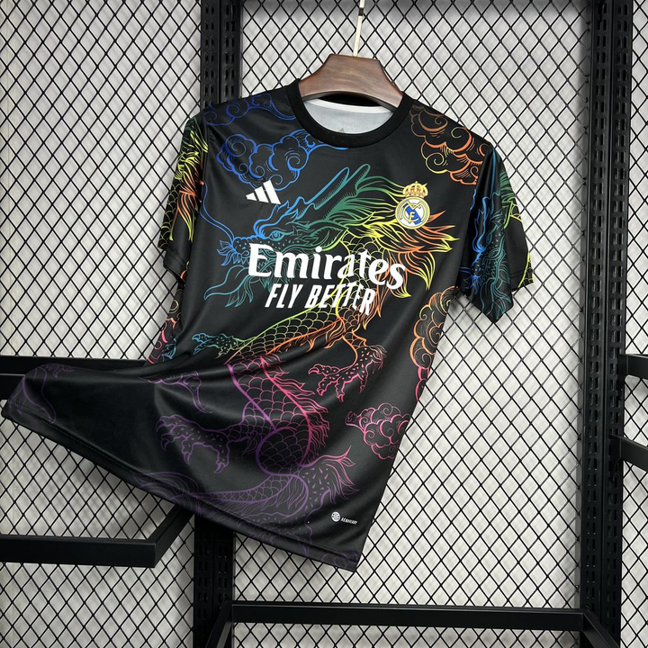Real Madrid Dragon Jersey 2024-25 featuring a colorful dragon design and Emirates logo on a black background