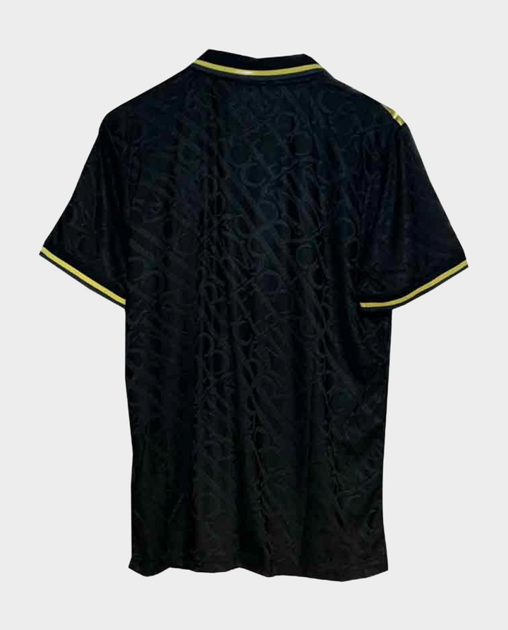 Back view of Real Madrid gold jersey 2023-24 featuring stylish design and vibrant colors