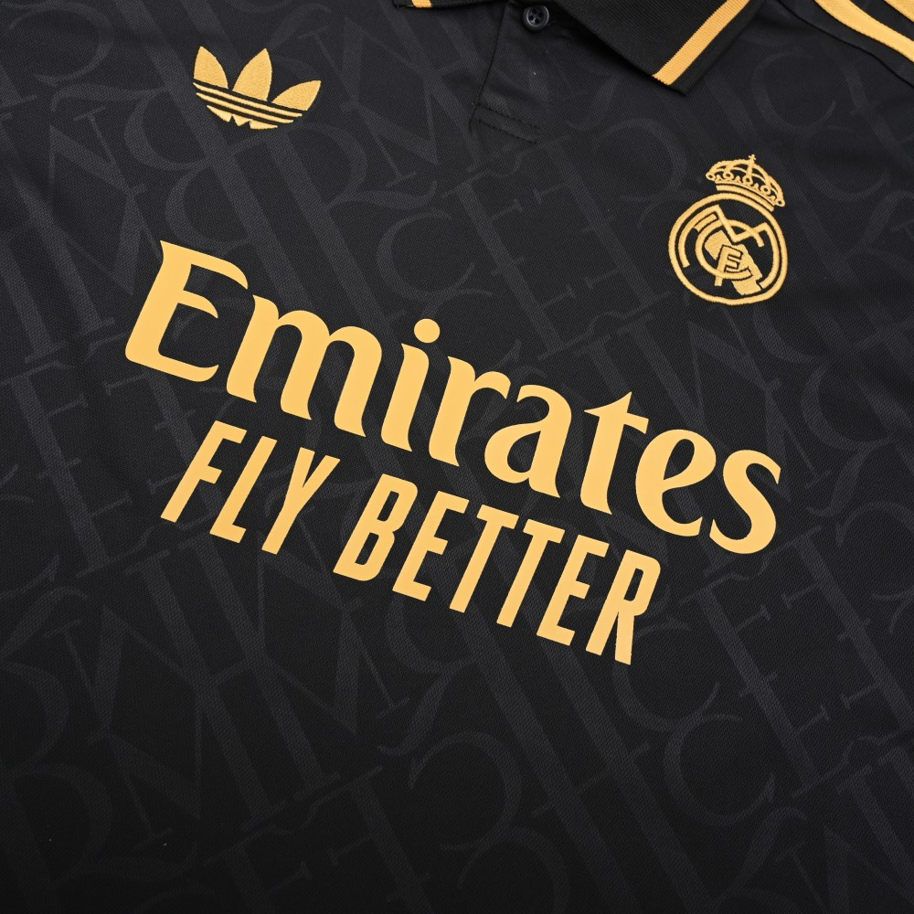 Real Madrid gold jersey 2023-24 with black and gold design featuring Emirates logo and Adidas branding