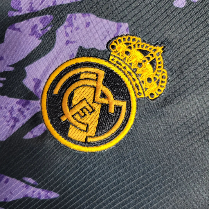 Real Madrid player version jersey featuring embroidered club logo in vibrant colors