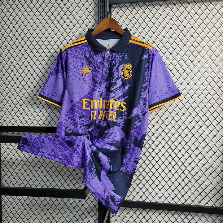 Real Madrid player version jersey in purple with vibrant design and official logos hanging on display