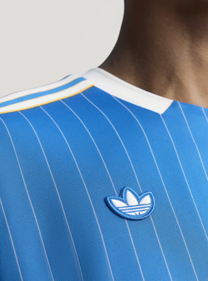 Striker Store Real Madrid terrace icon player version jersey featuring blue and white striped design