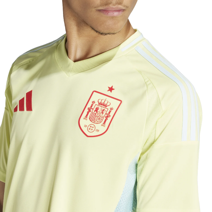 Spain away jersey 2024-25 in light yellow with the national emblem and Adidas logo